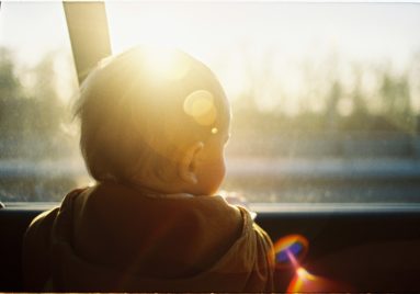 baby looking through car window