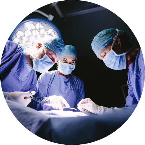 doctors performing surgery under medical lights